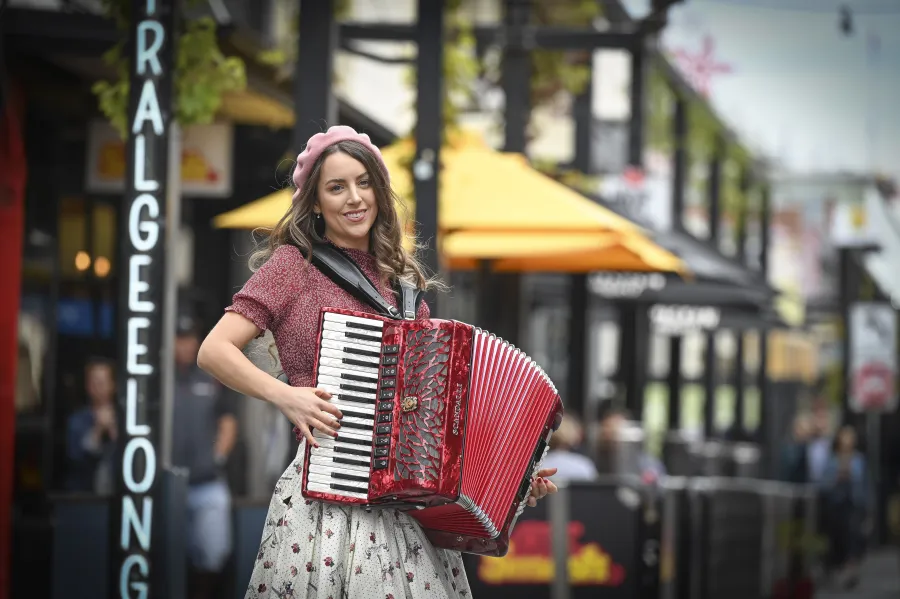 Busking.jpg Woman playing piano accordian in Lt Malop Street, Geelong.