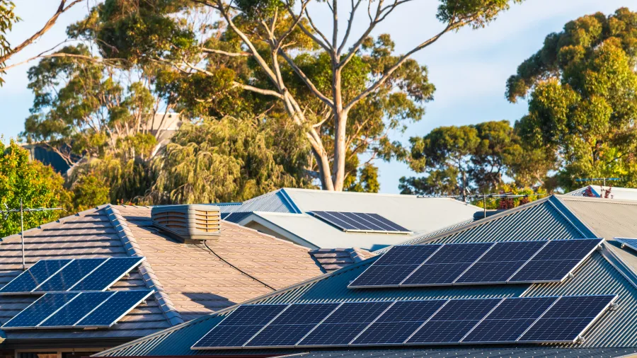 Climate Change Partnerships Grants - header image image showing solar panels on roofs