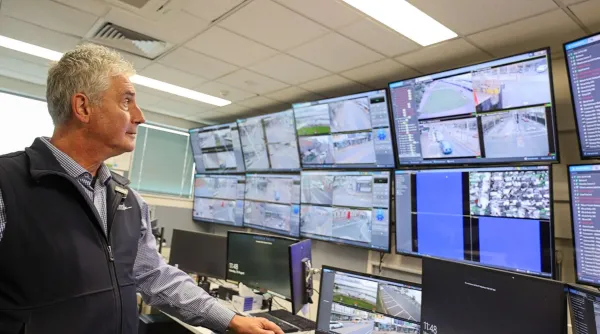 City safe cameras Man watching city safe cameras