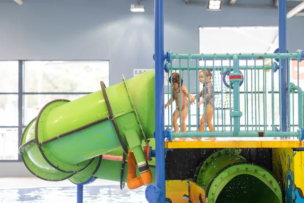 Bellarine Sports and Aquatic Centre Kids playing on waterslide at Bellarine Sports and Aquatic Centre