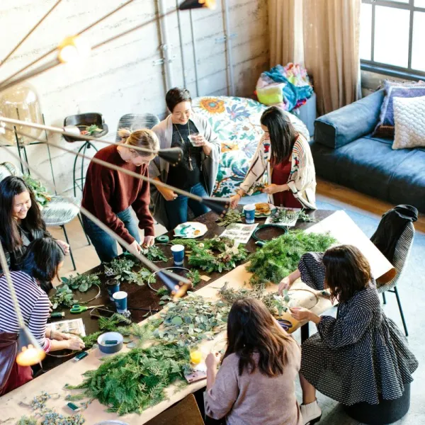 Geelong Community Directory Group of women arranging piles of herbs on a table