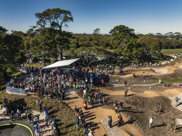 Group shot of all attendees (credit: Barwon Drone & Pam Hutchinson Photography) Aerial photo of the hundreds of attendees at the new bike park