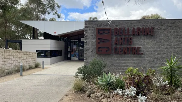 Bellarine Arts Centre Exterior image of grey building with green garden in front and brown text on the front wall